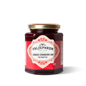 Jar of Halzephron Cornish Strawberry Jam with a red label on a white background