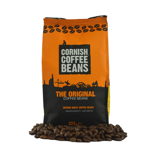 Cornish Coffee Beans packaging with coffee beans at the base on a white background