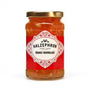 Jar of Halzephron Orange Marmalade with a red label on a white background