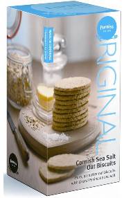 Box of Original Cornish Sea Salt on Biscuits with a candle and lemon slices in the background